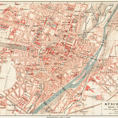 Vintage map of Munich, showing streets, rivers, and landmarks in red and beige tones.