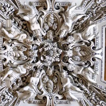 Ornate Baroque ceiling inside a historic church in Salzburg